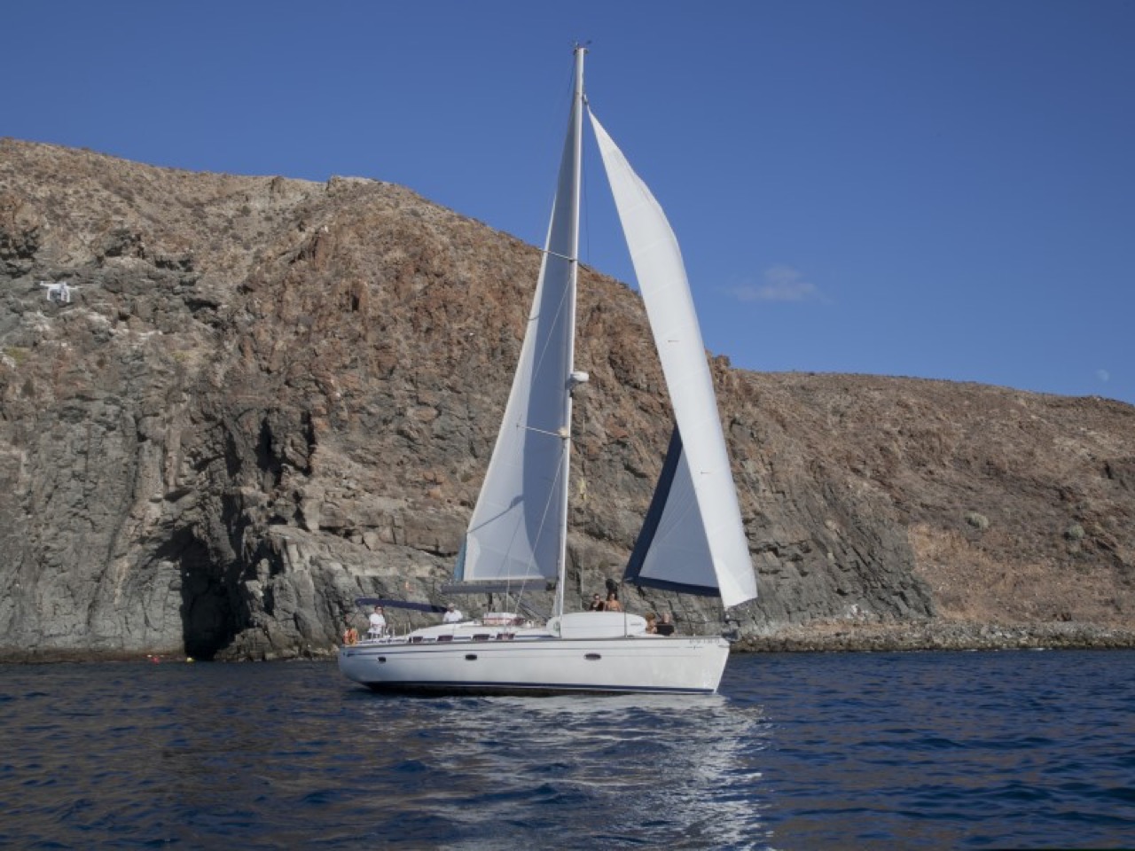 Picarus Sailing sailboat sailing in front of the cliffs
